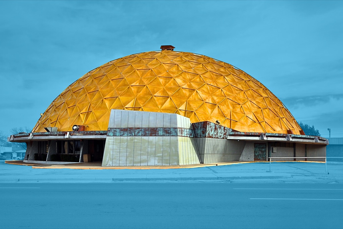 The Gold Dome at NW 23rd and Classen in Oklahoma City — a gold geodesic dome against a blue sky